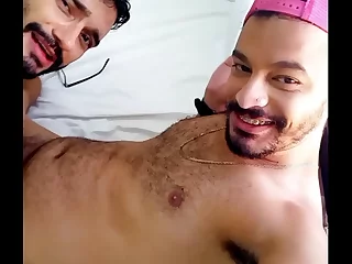 Thales Bottle, a tattooed hunk, eagerly services Marcos Goiano's throbbing member, leading to a passionate marriage proposal. Their bareback encounter intensifies with intense anal action, showcasing their insatiable desires.