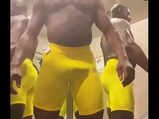 Steamy preview showcases a muscular ebony stud in tight Lycra shorts, flaunting his round, tantalizing butt and impressive package in a store's fitting room. A must-see for fans of big black cocks and solo action.