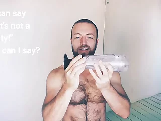 Experience ultimate pleasure with Doc Johnson's Main Squeeze masturbator. Watch as a muscular hunk with a hairy chest indulges in its enticing features, guaranteeing an unforgettable journey.